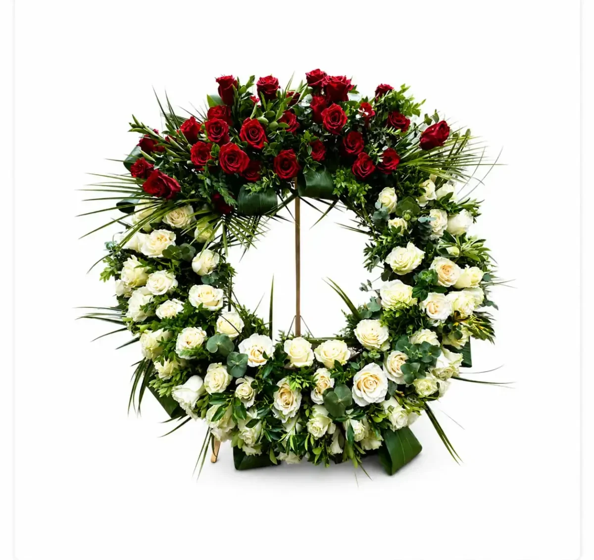 Coroana funerara rotunda din trandafiri albi si rosii cu verdeata decorativa si suport
